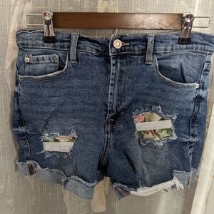 Mid wash distressed denim shorts by Kensie Jeans
